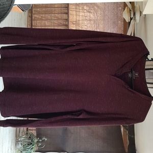 Long sleeve Henley shirt.